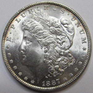 1887 Morgan Dollar - high grade uncirculated American silver dollar
