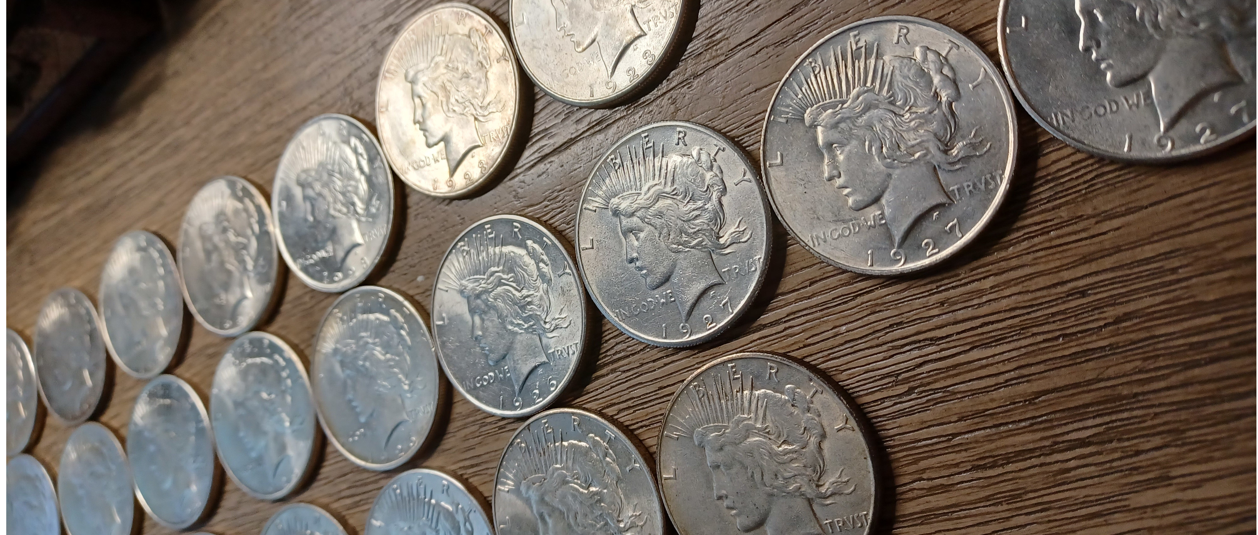 Silver Dollars, Peace Dollars on a Desk